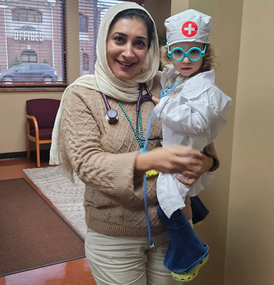 Dr. Akbar with a Child who want's to be a doctor Dr. Akbar with a Child who want's to be a doctor